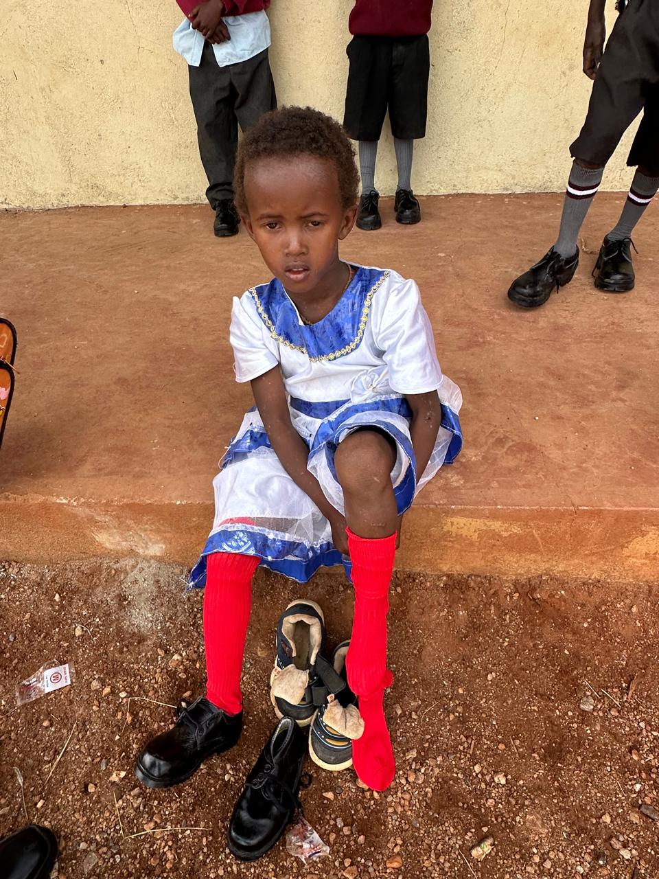 Girls and children during community support